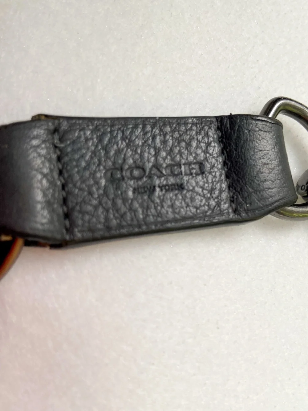 Coach trigger leather